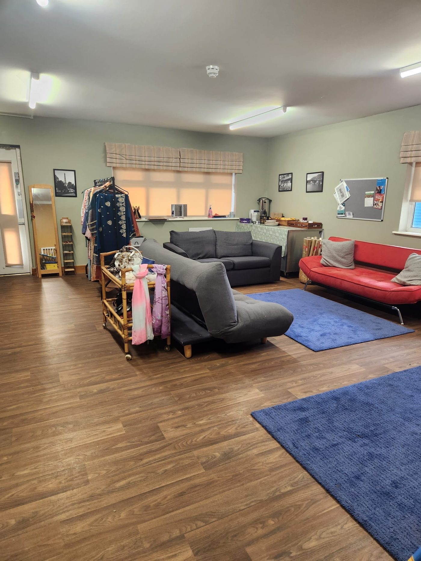 The WISE lounge with sofas, rugs and a refreshments table